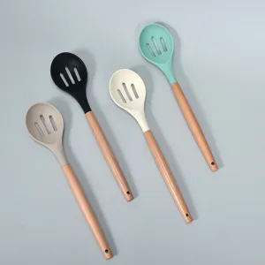Silicone slotted spoon with solid wood handle, non-stick cooking kitchenware skimmer.