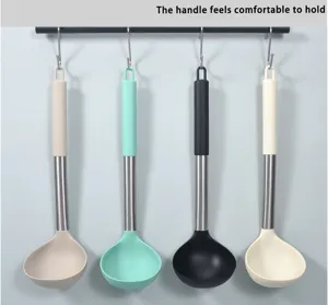 Stainless steel handle silicone soup spoon, heat-resistant kitchen cooking tool detail.