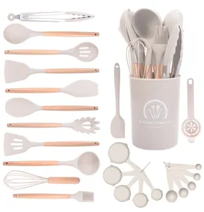24-piece silicone kitchen utensil set with wooden handles and storage holder for non-stick cookware.