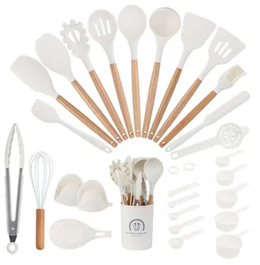 Detailed view of 28 pcs silicone kitchen utensils set with wooden handles and storage holder.