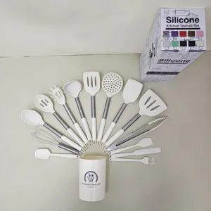Detailed view of the 15-piece white silicone kitchen utensil set with storage holder and box.