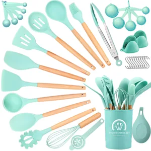 Silicone kitchen utensil set with wooden handles, heat-resistant cooking tools in mint green.