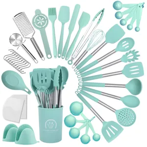 Mint green silicone kitchen utensil set with stainless steel handles, spatula spoon cooking tools