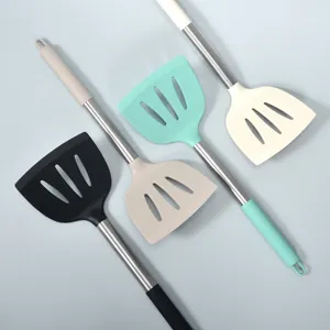 Large silicone slotted spatula with stainless steel handle, heat resistant cooking turner.