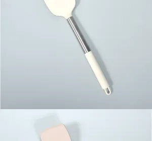 Silicone spatula detail close-up showing heat-resistant head and stainless steel handle.