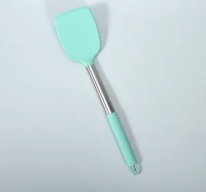 Silicone spatula with stainless steel handle, heat resistant kitchen cooking tool detail.