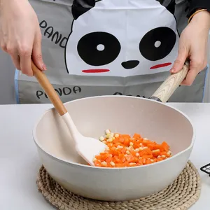 Milky white wooden handle silicone kitchenware non-stick pan and spatula kitchen cooking tool set.