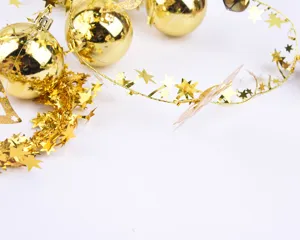 Gold Christmas star tinsel garland and balls set for tree decoration holiday party supplies.