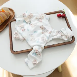 Cozy cotton pet dog jumpsuit detail showcasing cute bear print and functional metal back ring.