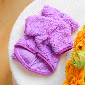 Purple fleece pet clothing detail view, soft thermal puppy costume for cold winter weather.