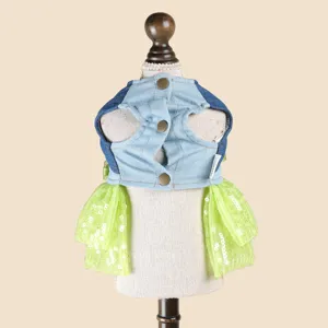 Detail view of denim pet dress with green sequin tutu skirt for small dogs party apparel.