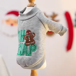 Grey pet dog sweater with gingerbread man embroidery, turtleneck winter pet apparel detail.