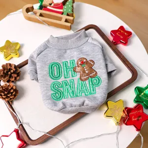 Cute Christmas pet dog sweater with gingerbread man embroidery, soft grey crewneck apparel.