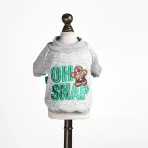 Cute Christmas pet sweater for small dogs with gingerbread man embroidery and soft crewneck design.