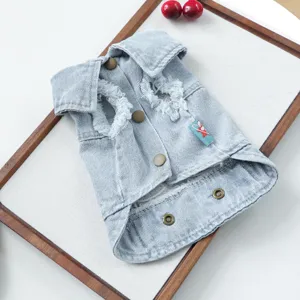 Pet denim vest for small dogs and cats, sleeveless lapel design with distressed frayed edges.