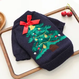 Cozy dark blue pet Christmas sweater with embroidered tree and red bow detail for dogs and cats.