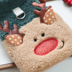 Cute Christmas reindeer fleece pet vest detail shot, soft plush material with D-ring.