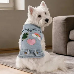 Adorable denim jacket for small dogs, stylish pet vest featuring cute colorful patches.