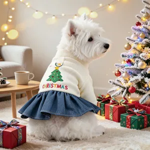 Cute Christmas dog dress with knitted top and denim skirt, featuring holiday tree embroidery.