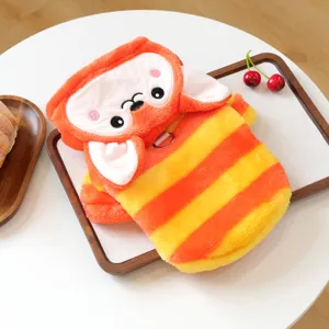 Detailed view of cute pet winter warm fleece clothing with orange yellow stripes and animal hood.