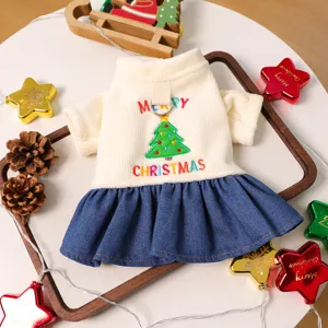 Cute pet Christmas dress for small dogs, featuring a knit top, denim skirt and festive tree embroidery.