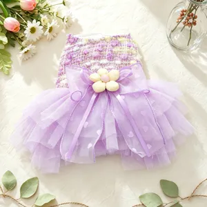 Detailed view of the purple pet puppy dress with tulle skirt, bow and flower decor.