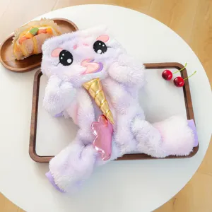 Fluffy unicorn pet costume detail showing soft pastel plush material and gold horn accent.