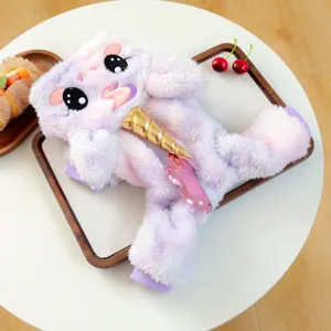 Close-up of cute purple unicorn plush pet winter costume featuring a shiny golden horn.