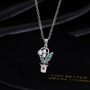 Exquisite Zirkon Blumen Topf Halskette, elegante silberne Kette fuer mode Frauen.