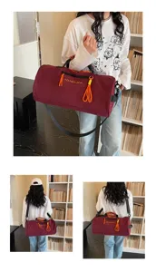 Large capacity cylinder waterproof sports gym duffel bag with wet dry separation and straps.