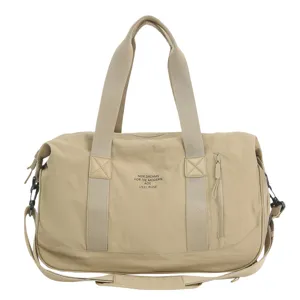 Large capacity khaki duffle bag for travel and gym, lightweight with shoulder strap main.