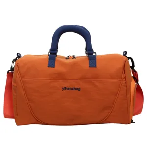 Large capacity travel duffel bag with shoulder strap, convenient for sports and short trips.