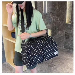 Black and white polka dot travel duffel bag, large capacity gym tote for women and men.