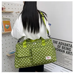 Green polka dot travel duffel bag with wet dry separation, large capacity fitness gym bag for women.