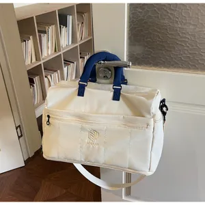 Large capacity travel duffel bag with stylish design, perfect for weekend trips and gym.