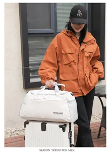 Large capacity travel duffel bag with dry wet separation, stylish shoulder bag for gym and sports.