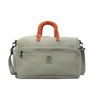 Large travel duffel bag with wet dry compartment, expandable luggage bag for fitness and trips.