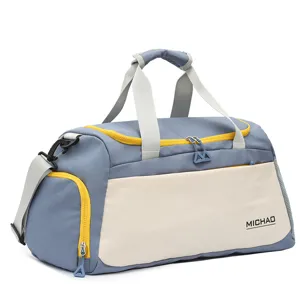 Large capacity travel duffel bag for sports and fitness with dry wet separation design.