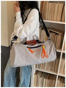 Large capacity cylindrical gym duffel bag waterproof travel sports bag with shoulder strap.
