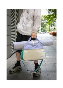 Casual color-block travel shoulder bag with yoga mat holder for women, large capacity.