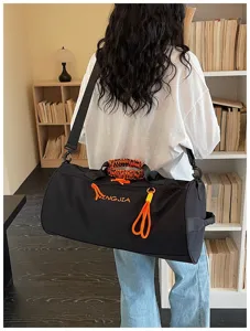 Large capacity cylindrical travel duffel bag with wet dry compartment for sports and fitness.