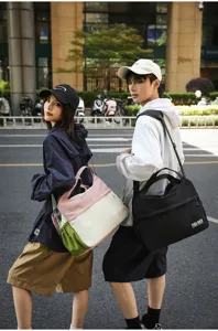 Casual Japanese harajuku style color block canvas shoulder bag for daily travel use.