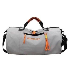 Grey cylindrical gym duffel bag with orange accents, large capacity waterproof travel bag main view.
