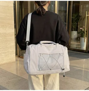 Large capacity casual gym travel duffel bag with dry-wet separation and expandable design for sports.