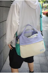 Japanese colorblock shoulder bag detail showing large capacity, lightweight and trendy design.
