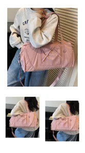 Pink large capacity shoulder travel duffel bag with cute bow and adjustable strap.