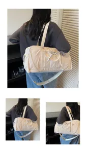 Large capacity shoulder duffel bag for travel, fitness and gym with multi-pocket design.