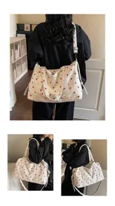 Large capacity corduroy travel duffel bag with cute strawberry print, shoulder strap.