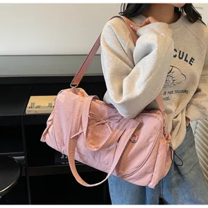 Pink large capacity shoulder duffel bag for short travel and gym fitness daily use.