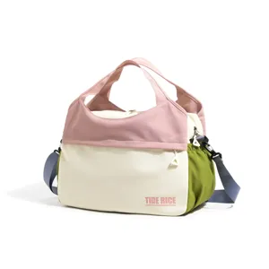 Colorful color-blocking travel handbag for women, large capacity shoulder bag style.